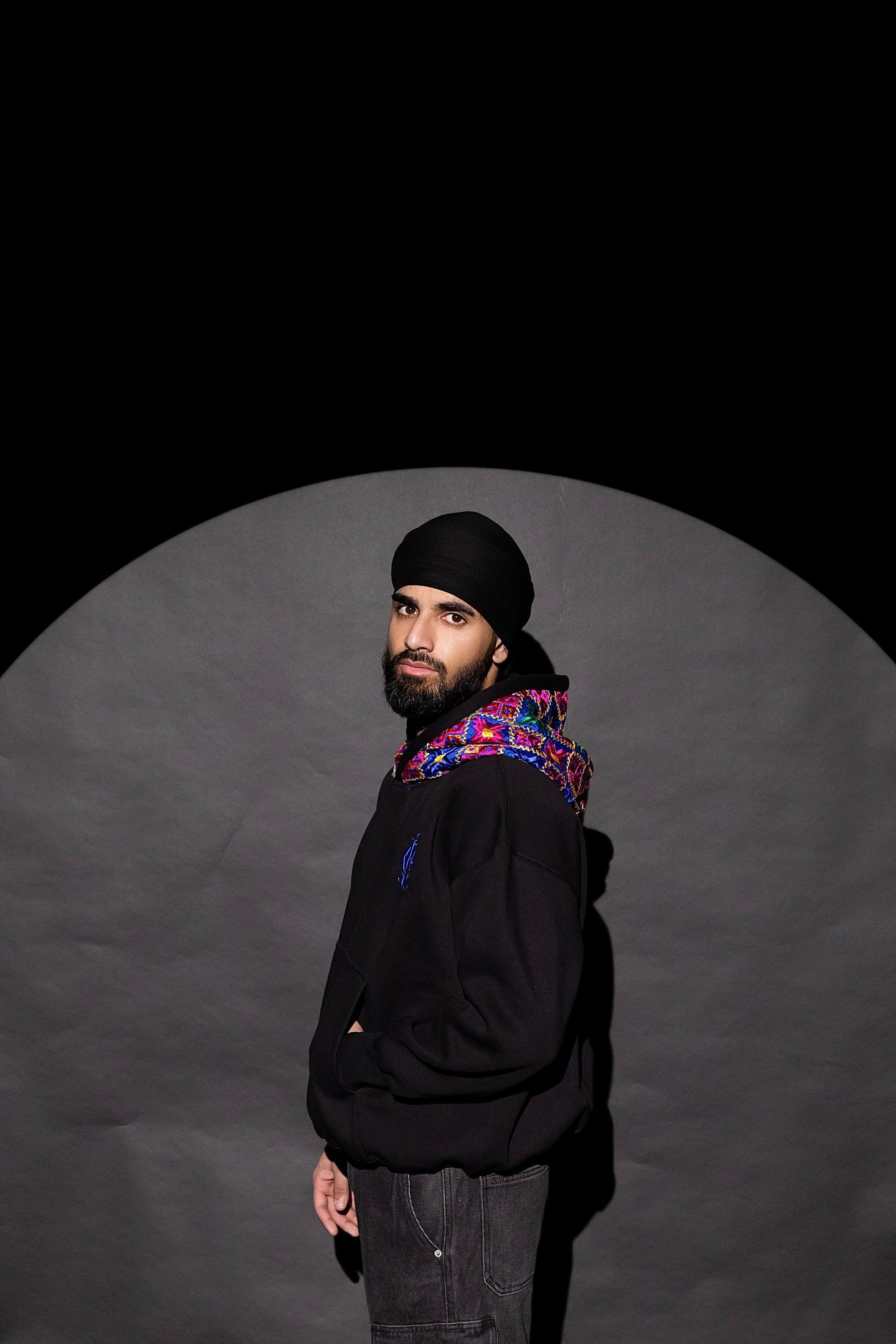 YOR OG Blue Phulkari Hoodie in black with our blue phulkari on the hood
