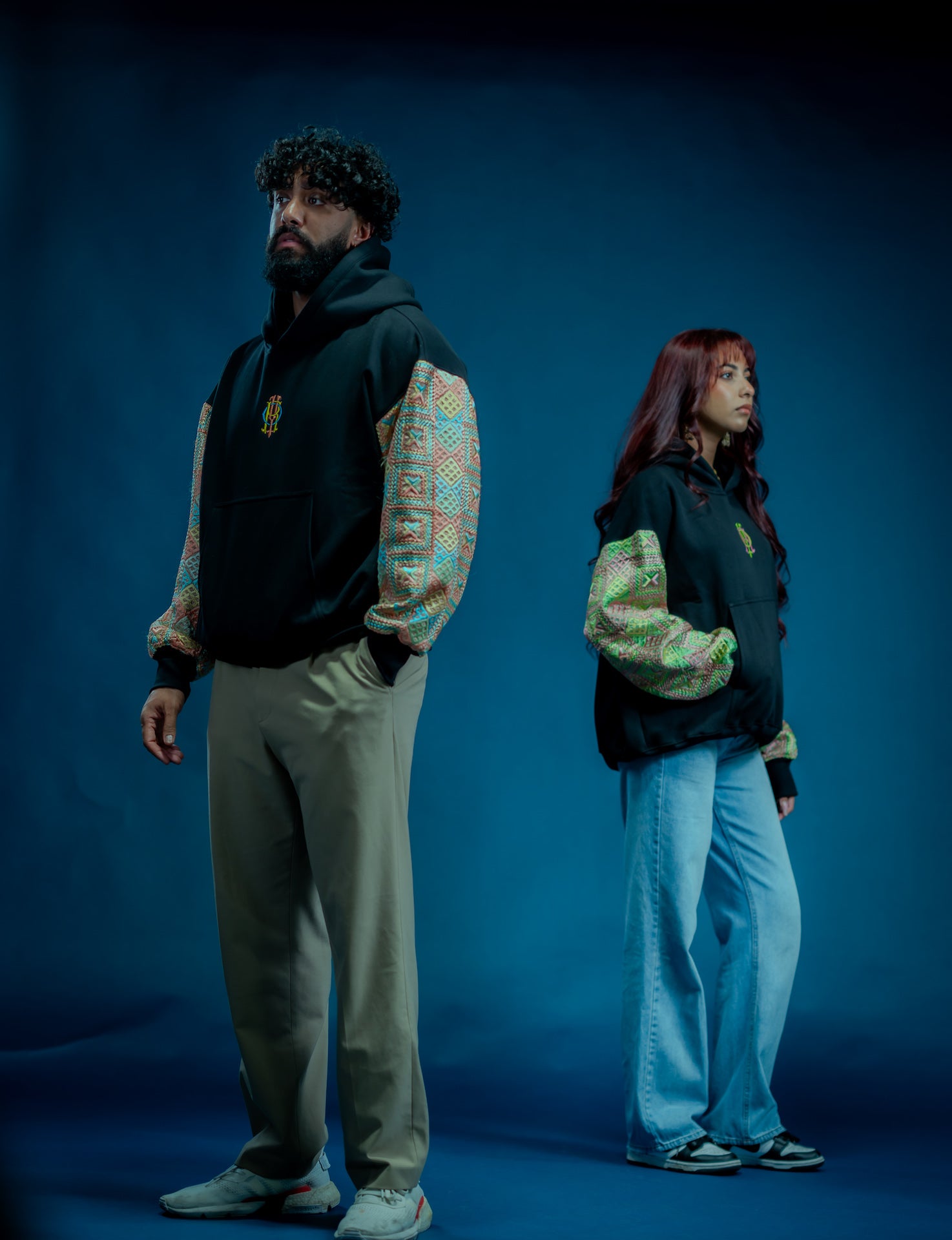 YOR Pastel Phulkari Hoodie in black featuring soft pastel colored phulkari on sleeves